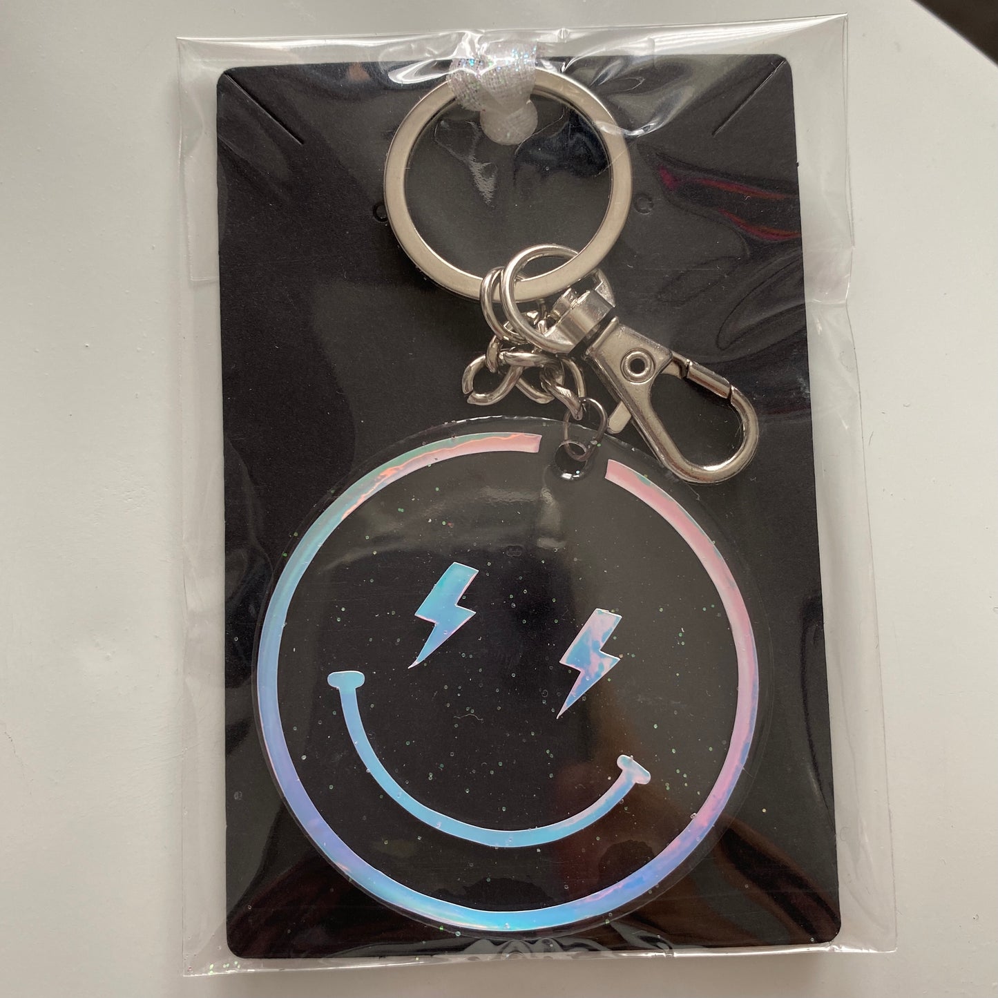 Porte-clés "Happy face" holographique